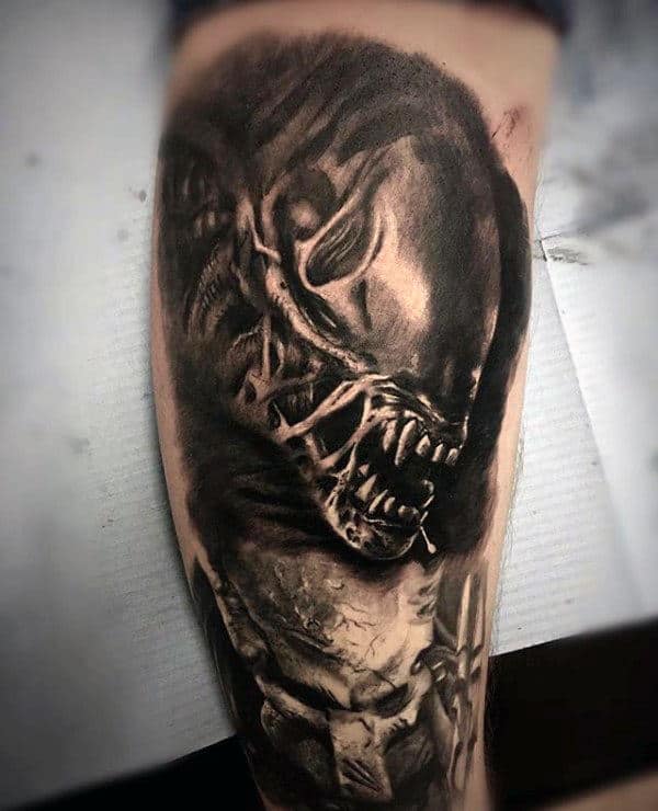 Male Alien Black And Grey Shaded Arm Tattoos