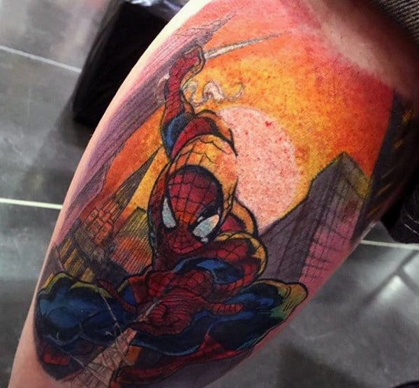 Male Ankles Spiderman In Flight Tattoo