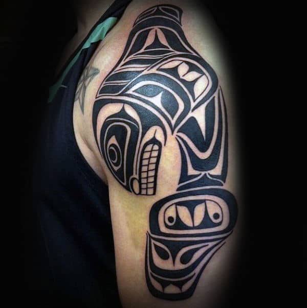 Male Arms Ethnic Dark Colored Haida Tattoo