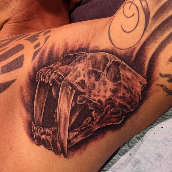 Male Arms Large Toothed Creature Tattoo