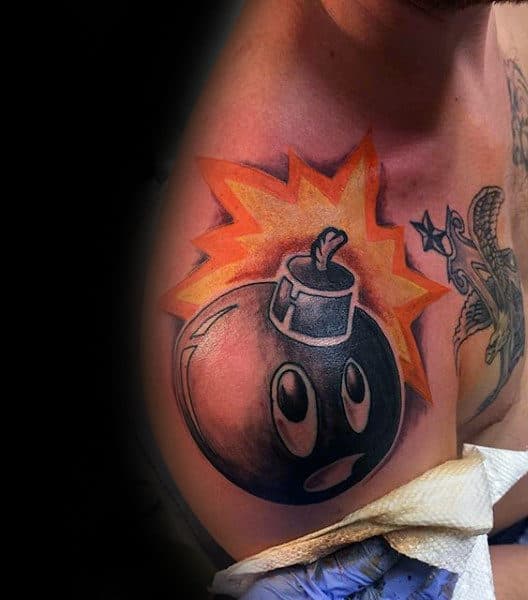 Male Arms Sad Faced Black Bomb Explosion Tattoo