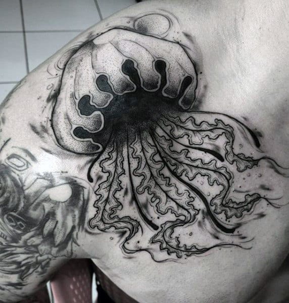 Male Chest Jellyfish With Curvy Tentacles Tattoo