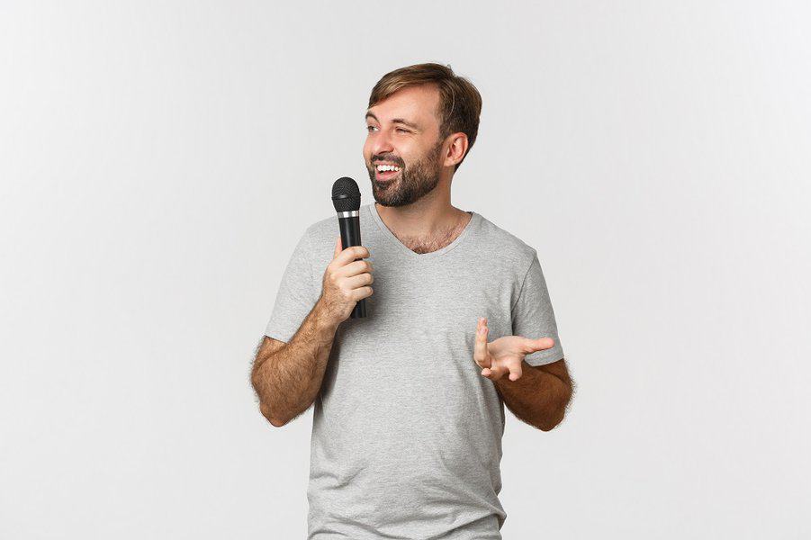 male comedian making a speech