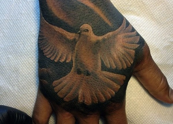 Dove Tattoo Meaning - What Do Dove Tattoos Symbolize?