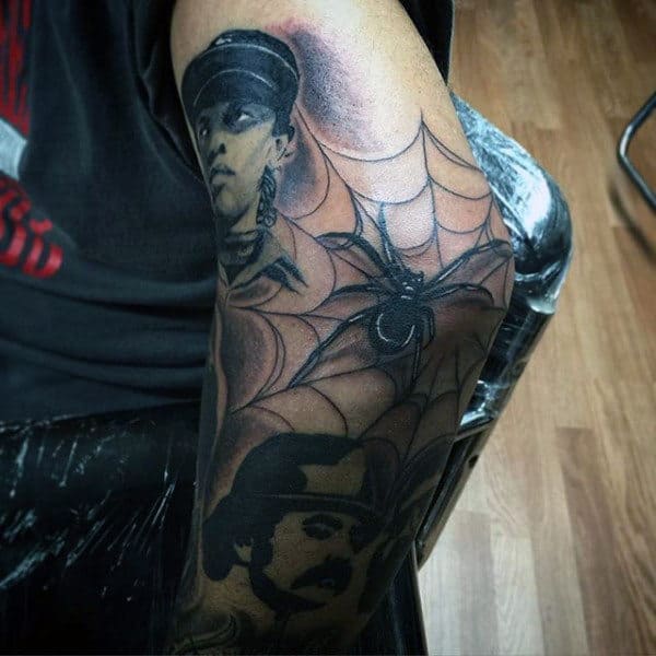 Male Elbow Web Tattoo