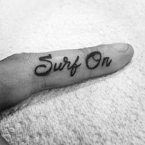 Male Fingers Surf On Tattoo