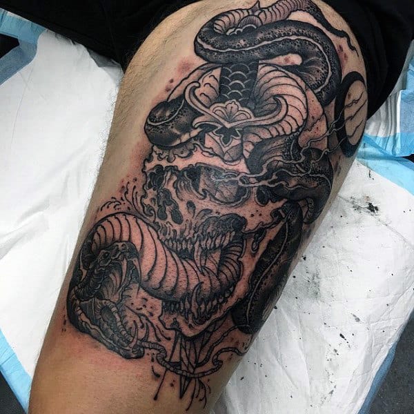 Male Forearms Interesting Tattoo Of Twisted Snake And Skull Tattoo