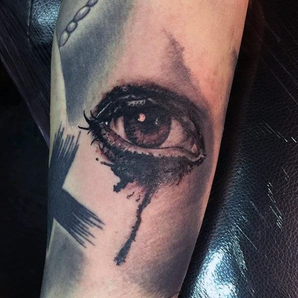 Crying eye tattoo