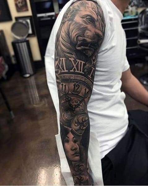 Male Full Sleeves Black And Grey Lion And Clock Tattoo