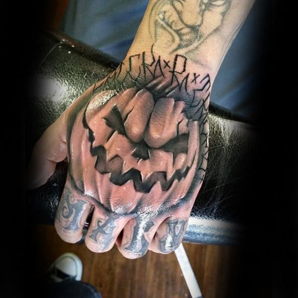 Male Hands Glossy Pumpkin Halloween Tattoo