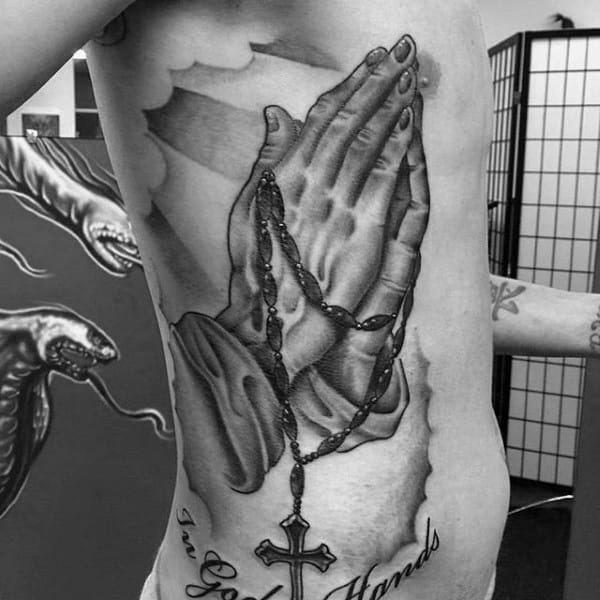 Male Hands With Rosary Tattoo On Rib Cage Side Of Body