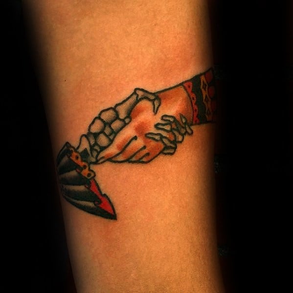 Male Handshake With Grim Reaper Forearm Tattoo Design Inspiration