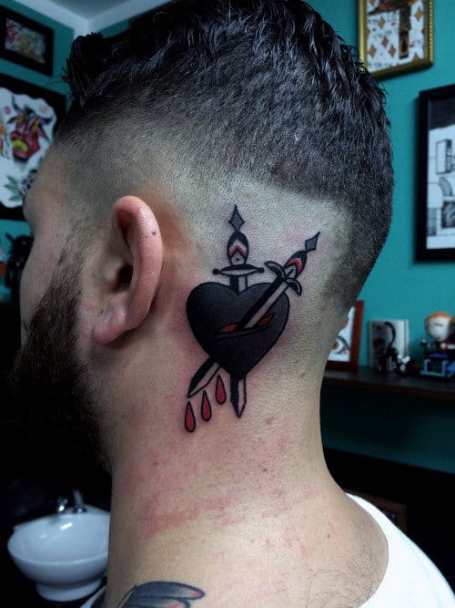 male-head-broken-heart-with-pair-of-arrows-tattoo