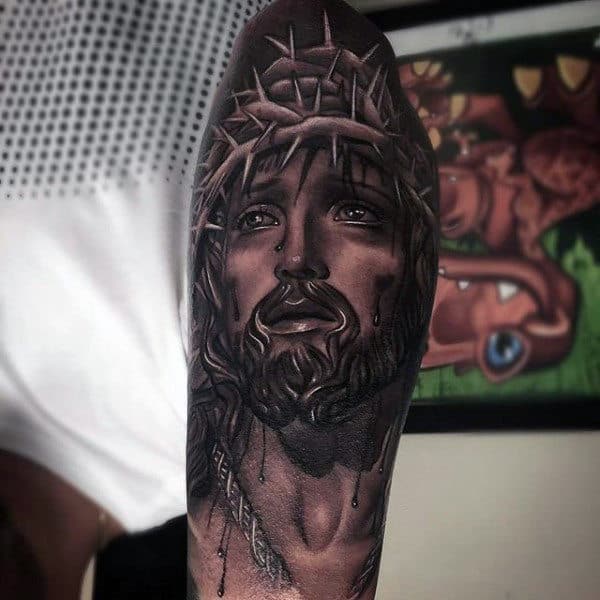 Male Jesus Portrait Arm Tattoos