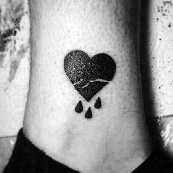 Male Lower Leg Crying Broken Heart Tattoo Design Inspiration