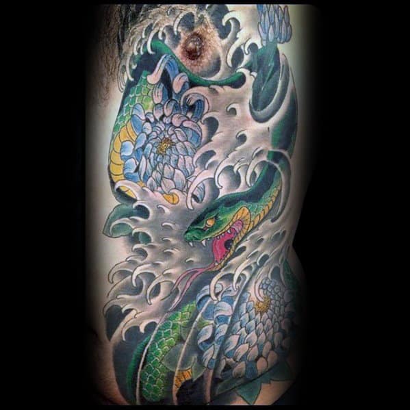 Male Rib Cage Side Tattoo With Waves And Green Japanese Snake Design