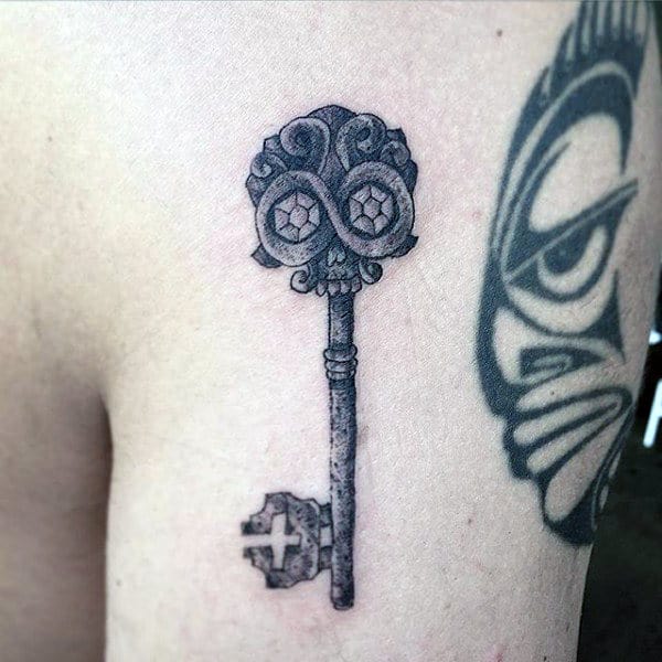 Need creative advice I got this skeleton key tattoo a few years ago with  my mother  2 sisters on a whim Its too plain for my taste any  suggestion for additions