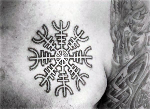 Male Small Chest Tattoo With Helm Of Awe Design