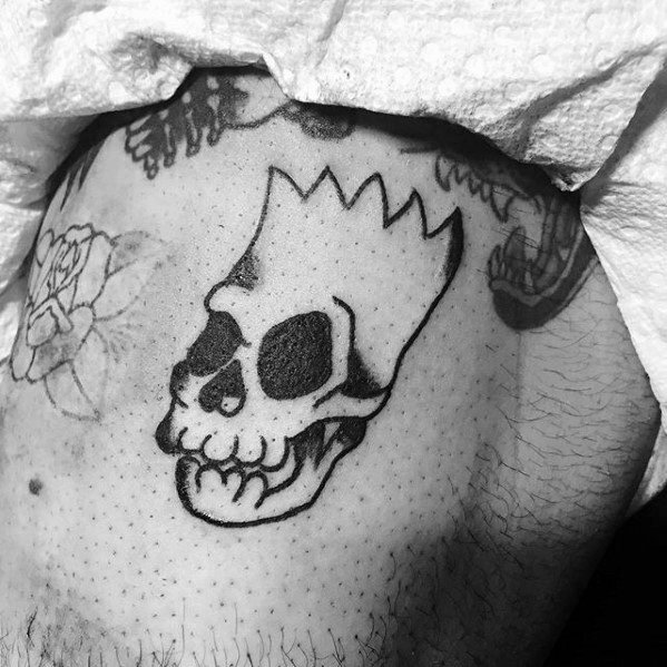 Male Small Skull Tattoo With Bart Simpson Design