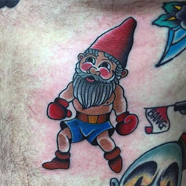 Male Tattoo Ideas Gnome Boxing Themed Design On Chest.