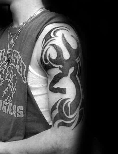 Male Tattoo With Animal Deer Tribal Design On Arm