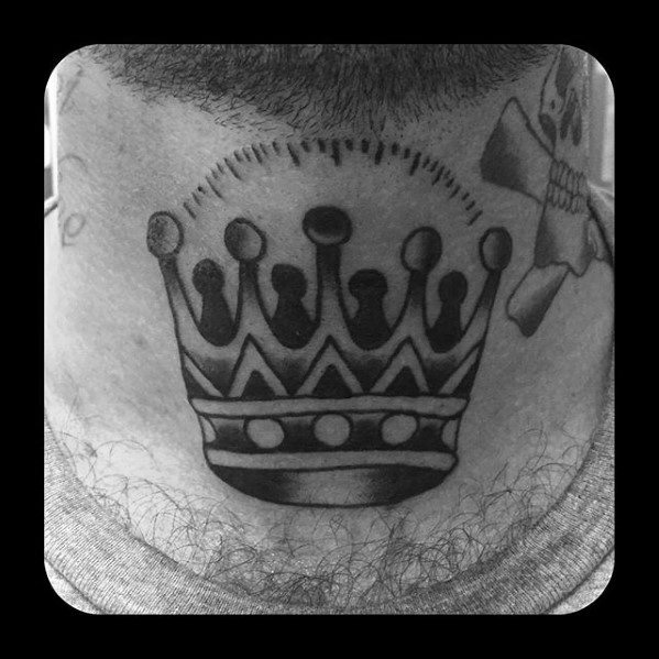 Male Tattoo With Traditional Crown Design.