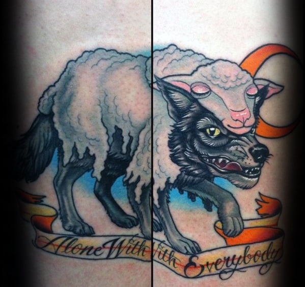 Male Tattoo With Wolf In Sheeps Clothing Design On Arm