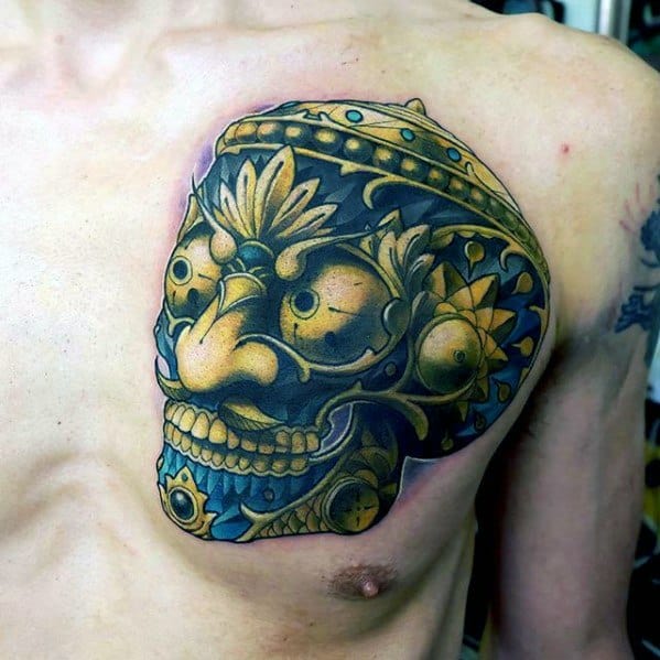 Male Tibetan Skull Upper Chest Tattoo Design Inspiration