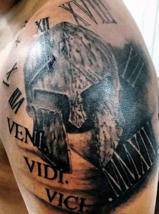 Side tattoo saying Veni vidi vici on Teresa.