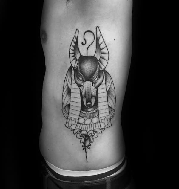 Male With Anubis Tattoo On Rib Cage Side Of Body