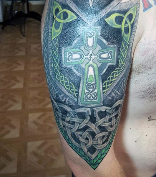 Male With Celtic Tattoo Cross On Arm