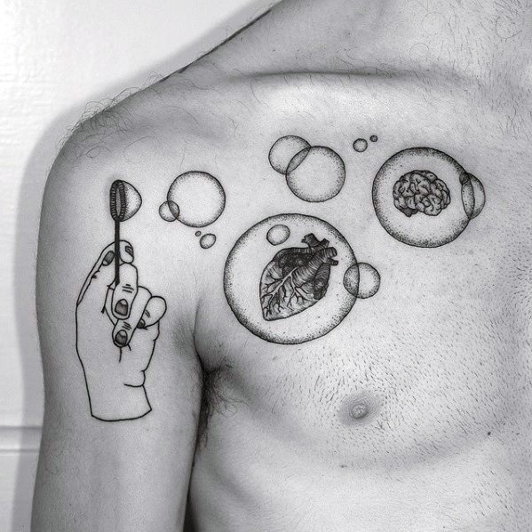 Male With Cool Chest Blowing Bubbles Tattoo Design