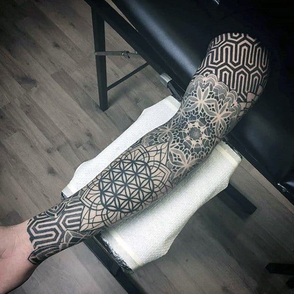 Male With Cool Geometric Sleeve Tattoo Design