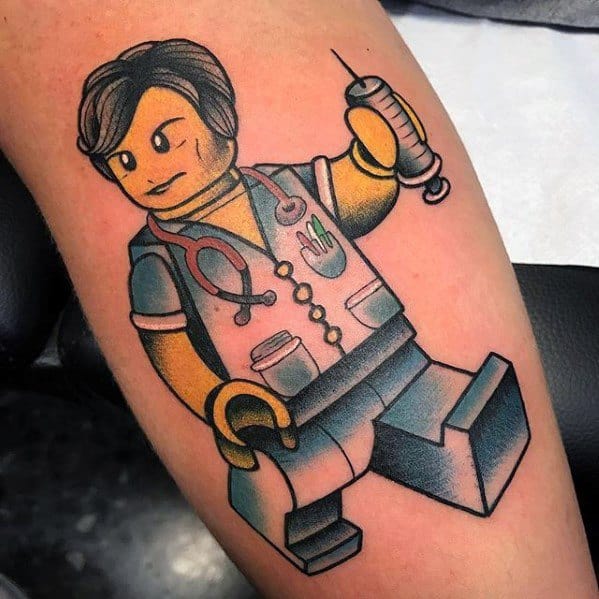 Male With Cool Lego Tattoo Design