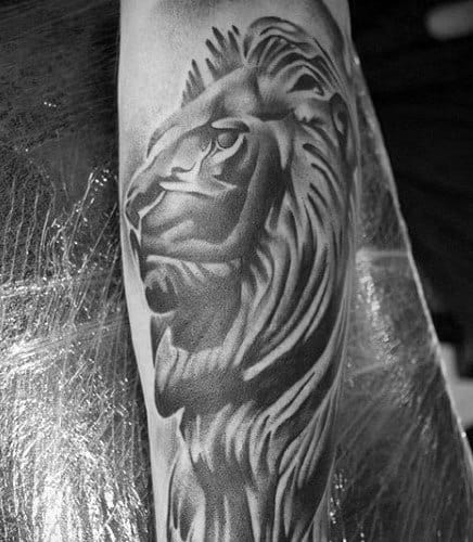 Male With Cool Lion Statue Tattoo Design