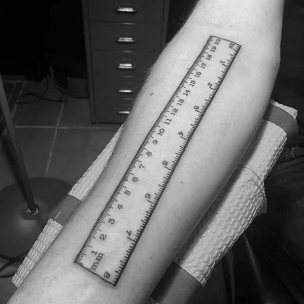 Male With Cool Ruler Tattoo Design On Inner Forearm