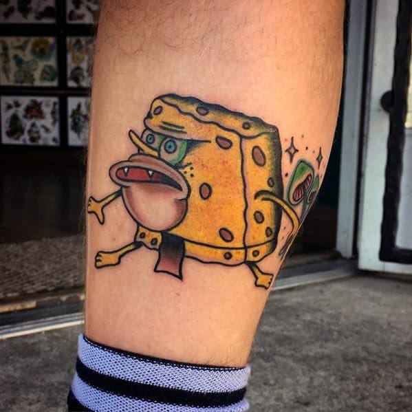 Male With Cool Spongebob Tattoo Design On Lower Leg