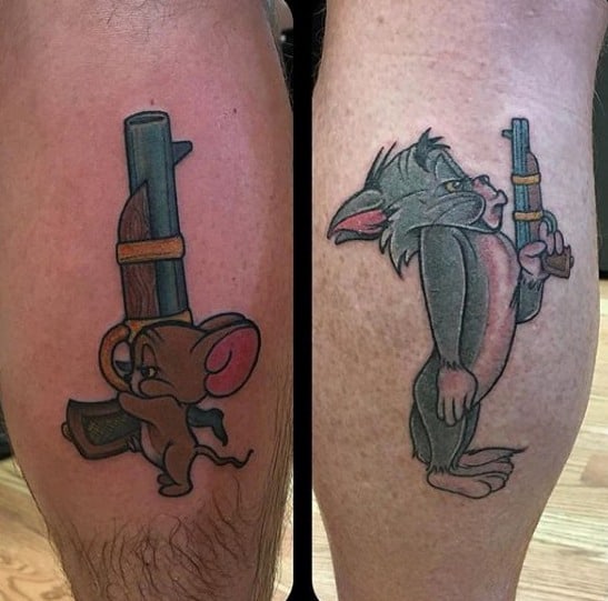 Male With Cool Tom And Jerry Tattoo Design