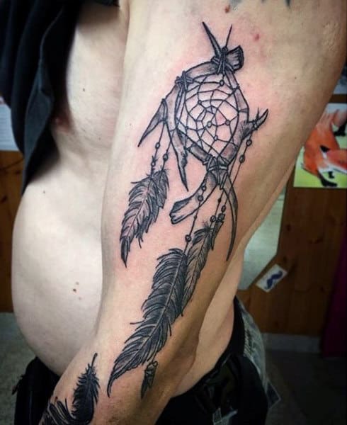 Male With Dreamcatcher Arm Tattoo
