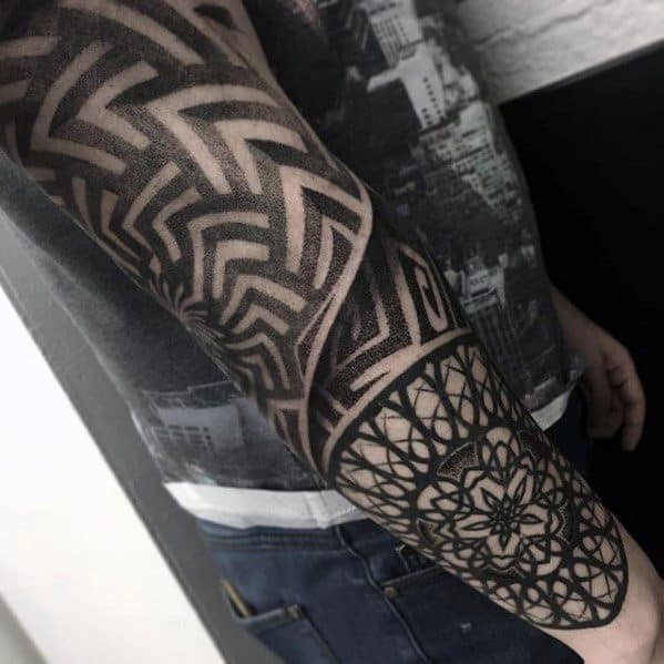 Male With Geometric All Black Pattern Sleeve Tattoo