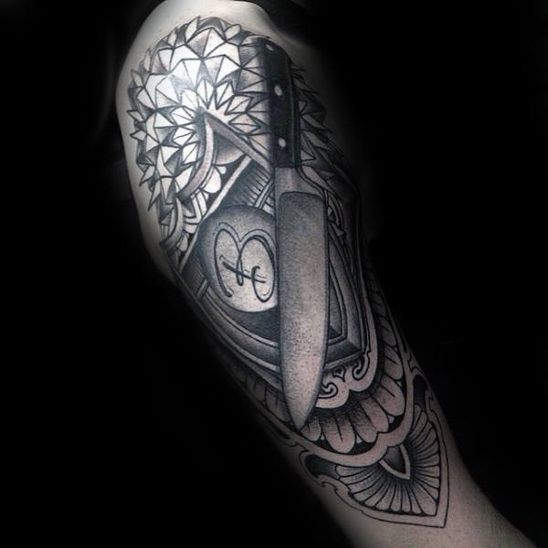 Male With Half Sleeve Floral Chef Knife Tattoo