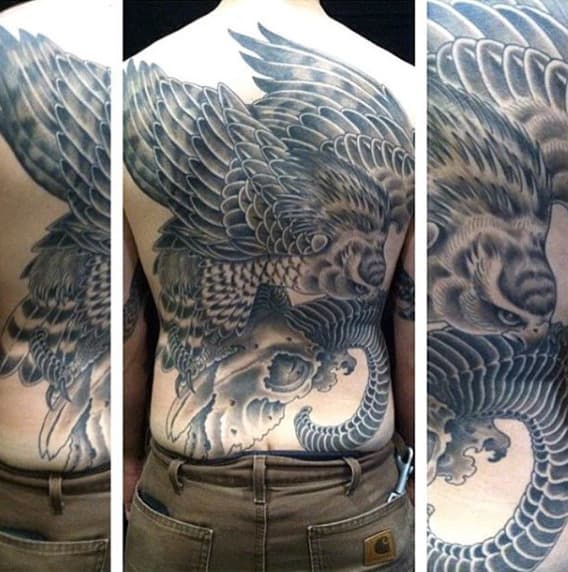 Male With Hawk On Ram Skull Full Back Tattoo