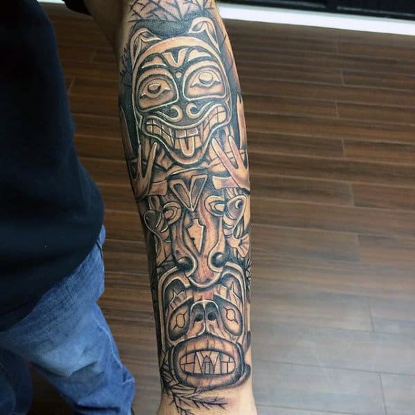 Male With Lightly Shaded Manly Half Sleeve Totem Pole Tattoo