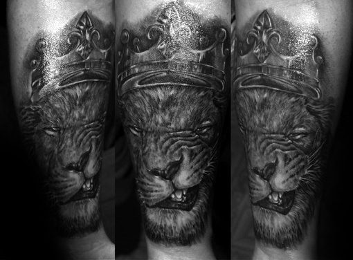 Male With Lion With Crown Forearm Tattoo Design