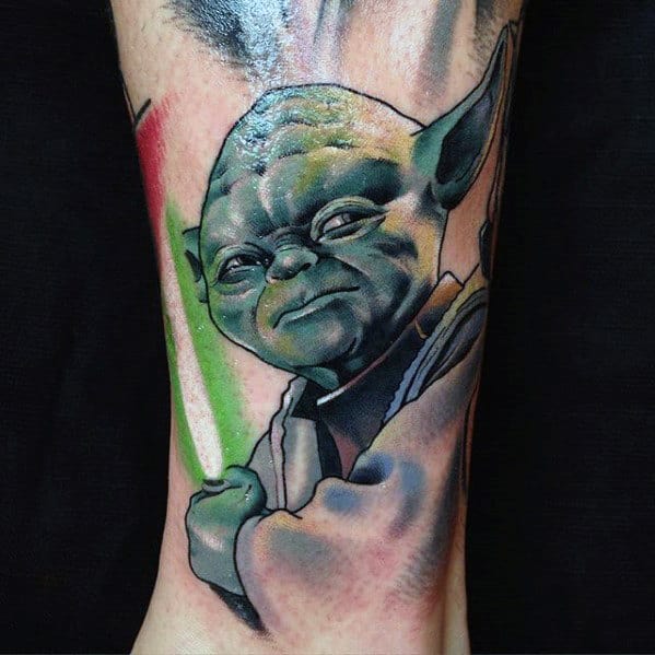 Male With Lower Leg Tattoo Design Of Yoda