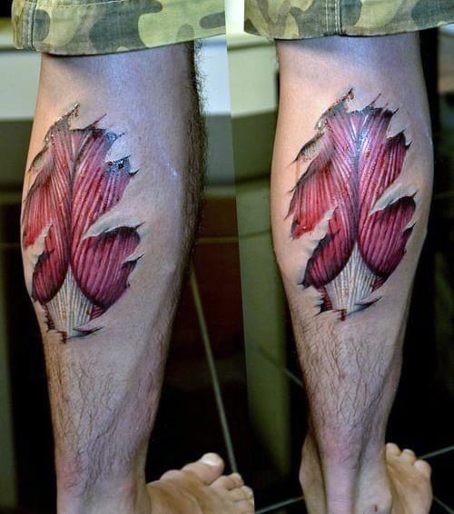 Male With Muscle Ripped Skin Leg Calf Tattoo