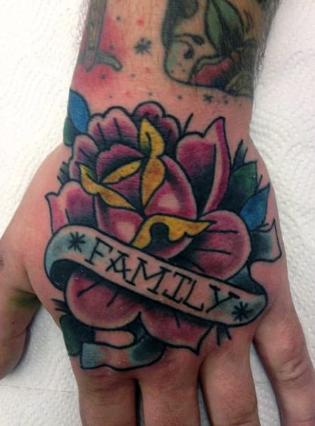 Male With Pink Rose And Family Ribbon Tattoo On Hands