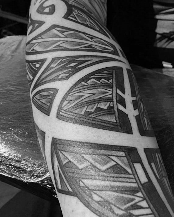 Male With Polynesian Tribal Negative Space Forearm Tattoo Sleeve