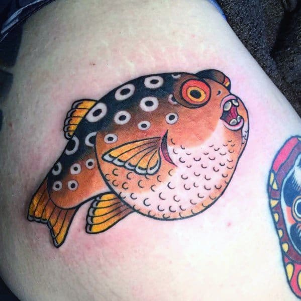 Male With Puffer Fish Tattoos
