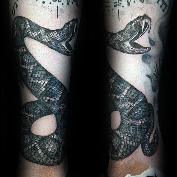 Male With Rattlesnake Lower Leg Tattoo